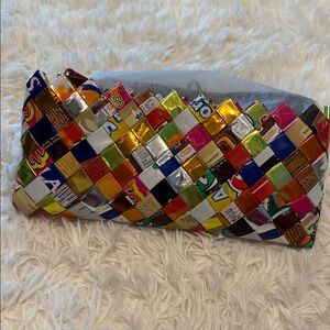 Nahui Ollin Multicolor clutch/wristle bag